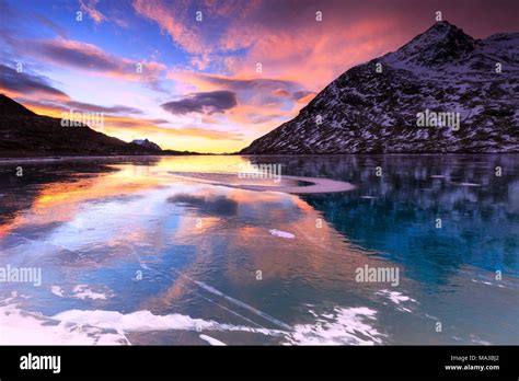 Stunning Sunrise On The Frozen Lago Biancowhite Lake Bernina Pass