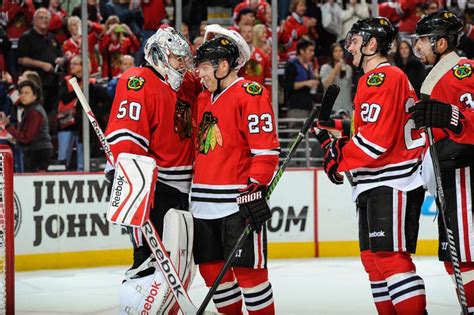 2 months ago by kipp heisterman. CHICAGO, IL - NOVEMBER 17: Goalie Corey Crawford #50 and Kris Versteeg #23 of the Chicago ...