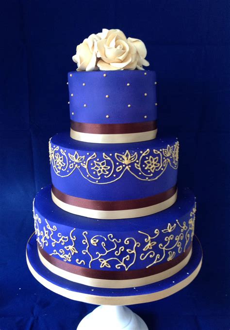 How to decorate a confetti cake. Vivid purple 3 tier wedding cake with gold piping and ...