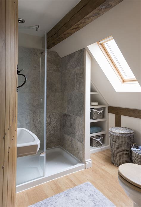 Half the space is in a rustic wood,. sloping walls | Loft bathroom, Loft room, Bathrooms remodel
