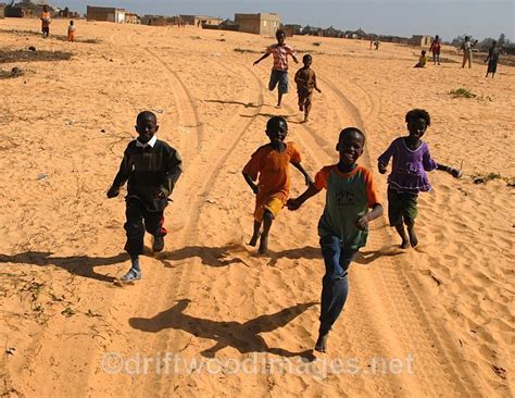 Senegal Fulani Village Fulani Children Running Behind 4x4