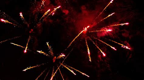 Download Wallpaper 2560x1440 Fireworks Sparks Smoke Red Dark