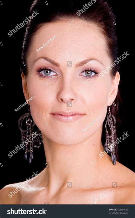 Close Up Portrait Of A Strikingly Beautiful Woman With Long Stylish Ear