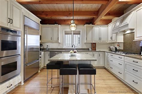 And in the fall, natural wood offers a touch of warmth that creates a cozy vibe in the kitchen. Pictures of Kitchens - Traditional - White Kitchen ...