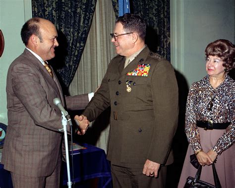 Secretary Of Defense Melvin R Laird Left Congratulates Gen Robert E