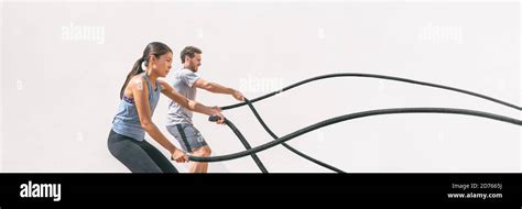 Gym Fitness Sport Fit Couple Working Out Battle Rope Exercise Banner