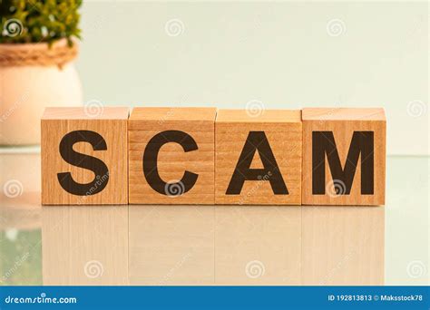 Scam Word Made With Building Blocks On White Background Stock Image