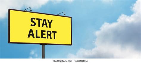 Stay Alert Yellow Warning Sign On Foto Stock 1733184650 Shutterstock