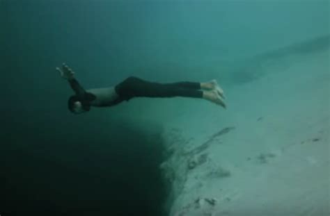 Man Dives Into Underwater Sinkhole In Stunning Terrifying Video