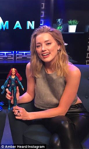 Amber Heard Unveils Her Mera Action Figure For Aquaman Daily Mail Online