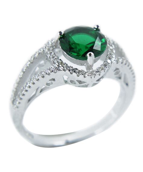 Because pure gold makes up 58.3% of the metal content of 14k gold, an engagement ring made from 14k gold will usually cost slightly less than the same ring made from 18k gold. Luxurious Antique 1 Carat Created Green Emerald Engagement Ring in 18k Gold over Silver - JeenJewels