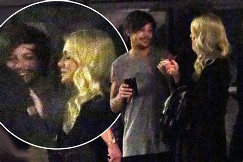 louis tomlinson spotted enjoying the company of a mystery blonde girl while having a cigarette