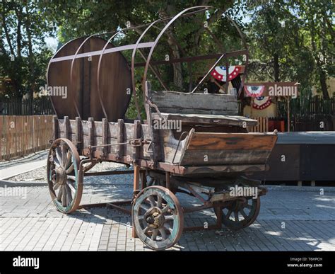 Antique Wooden Wagon With Wheels And Metal Structure Stock Photo Alamy