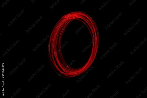 Long Exposure Photograph Of The Letter O In Neon Red Colour Fairy