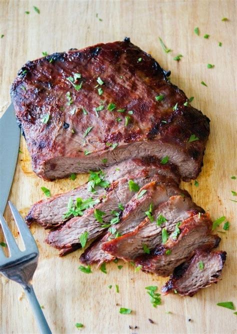 Pour the mixture into a small saucepan and bring to a simmer. Flank steak marinated in fresh ginger, ginger, soy sauce, and brown sugar; then grilled to pe ...