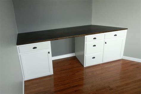 Maybe you would like to learn more about one of these? DIY Built-in Desk using kitchen cabinets after cutting off ...