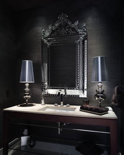 Elegant powder room is fitted with a restoration hardware maison powder vanity boasting an italian marble countertop finished with an oval sink and a polished nickel faucet mounted in front of an italian marble backsplash. Elegant Powder Room Ideas, Pictures, Remodel and Decor