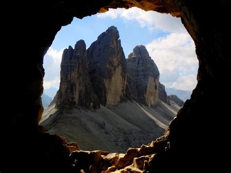 Tre Cime Di Lavaredo Seen From A Cave On Paterno Normal