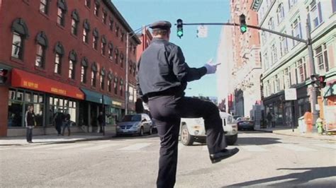 Dancing Policeman Delights Us Drivers And Pedestrians Bbc News