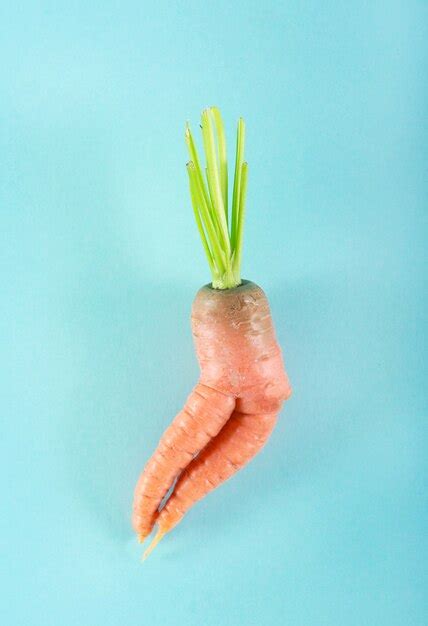 Premium Photo Funny Shaped Young Carrot