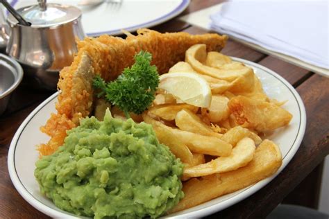 Traditional Fish And Chips With A Side Of Mushy Peas Yummy