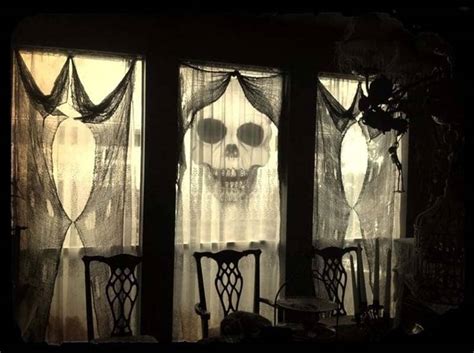 28 Spooky Halloween Silhouette Ideas For Decorating Your Windows