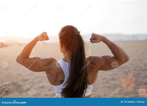 Strong Fitness Woman Flexing Biceps On Sunset Stock Image Image Of