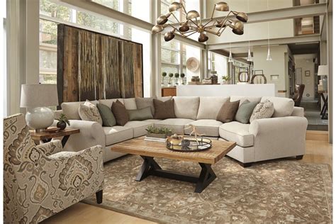 Wilcot 4 Piece Sectional With Cuddler Ashley Furniture Homestore In