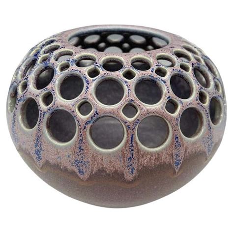 Handmade Pierced Ceramic Orb With Variegated Crystaline Glaze For Sale At 1stdibs Pottery