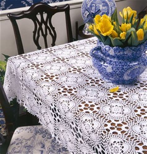 Cleaning the kitchen is a lot more fun with colorful crochet dishcloths. Crochet Cluster Motif Tablecloth ePattern | LeisureArts.com