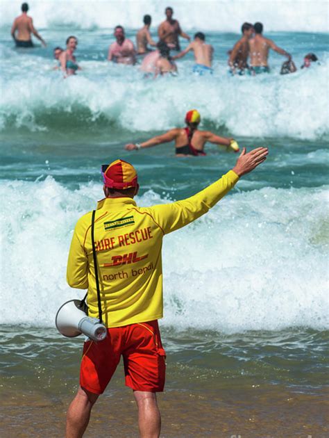 Lifeguard Actively Watching Bathers Ahead As The Waves Hit Bondi Beach