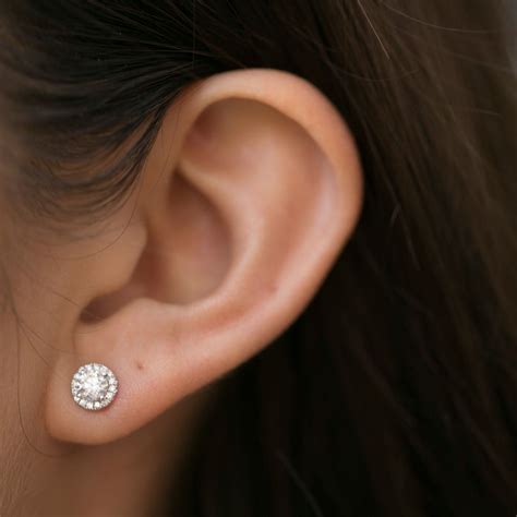 Round Halo Diamond Earrings From Steven Singer Jewelers Halo Diamond