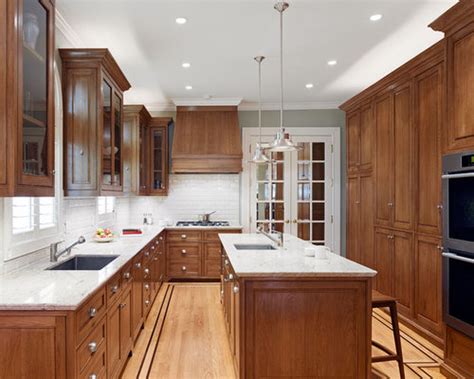See the before and after pictures of this farmhouse kitchen renovation with dark wood cabinets, quartz countertops and tile floors. Best White Countertops Design Ideas & Remodel Pictures | Houzz