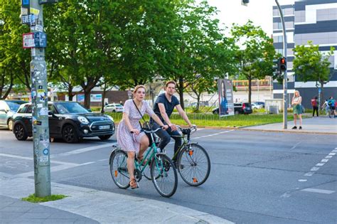 City Dwellers Ride Their Bicycles Around The City An Ecological Mode