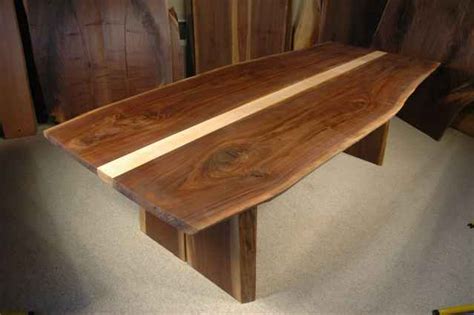 We are remodeling our home and are facing the dilemma of whether to go w/ birch or maple plywood for cabinet boxes. Custom Walnut and Curly Maple Slab Dining Table: By Paul Dumond's