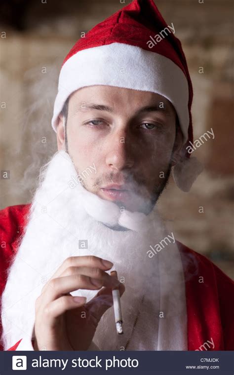 Bad Santa Smoking A Cigarette Stock Photo Alamy
