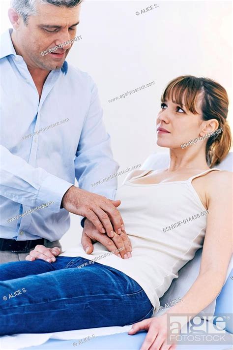 Doctor Examining A Patients Abdomen Stock Photo Picture And Rights