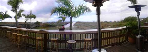 When there's tons of people crammed into a bar it may take a little while to get a drink, and maybe that would annoy me sometimes, but you're on the beach here, the waves are right. Jimmy B's Beach Bar - Hotels - St. Pete Beach, FL - Yelp