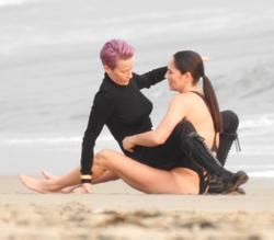 Megan Rapinoe And Sue Bird During A Romantic Photoshoot On The Beach In