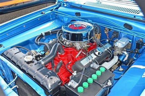 The 1965 Dodge Dart Engine Compartment Sporting A 318 Cid V 8 Engine