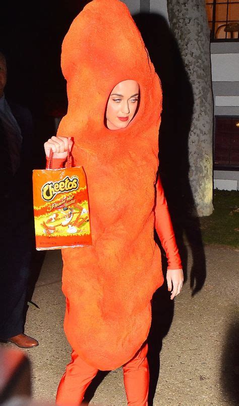 Katy Perry Dresses Up As A Massive Cheeto In One Dangerously Cheesy