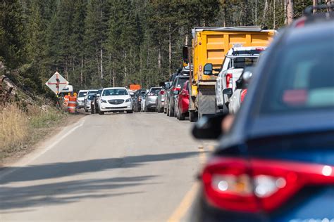 Yellowstone national park stretches more than 3,400 square miles through wyoming and montana, but a small portion of the park dips into. Traffic in road construction zone | NPS / Jacob W. Frank ...