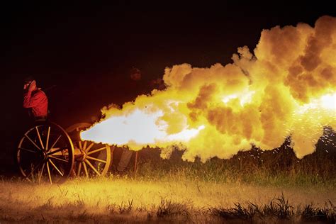 cannon firing at night photograph by david sams fine art america
