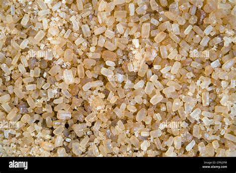 Yellow Crystals Of Cane Sugar Macro Background Stock Photo Alamy