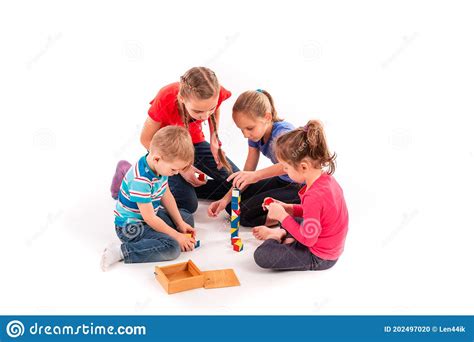 Happy Kids Playing With Building Blocks Isolated On White Stock Photo