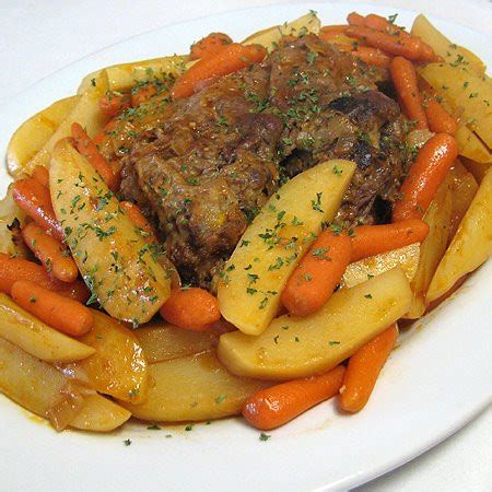Remove the onion, celery, and as much of the spices out of the liquid that the beef has been slice the corned beef against the grain. Oven Baked Pot Roast with Potatoes and Carrots