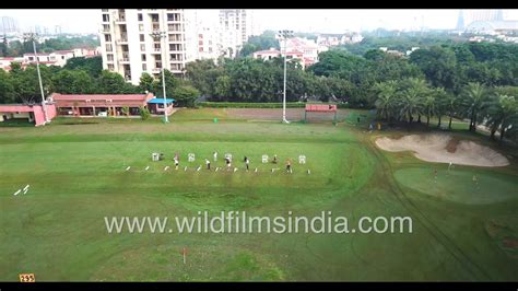 Noida Golf Course Greens Are Surrounded By Tall Concrete Jungle One