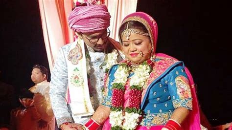 We Dont Know What To Feel About Bharti Singhs Bright Pink Wedding Lehenga Lifestyle News