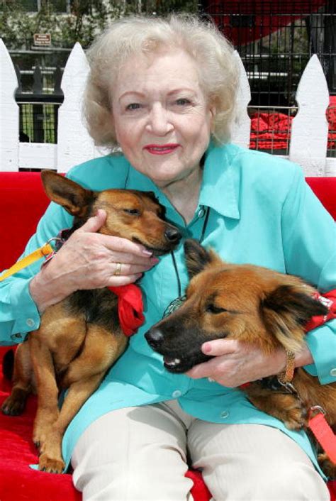 Betty White Being Adorable With Animals Pictures