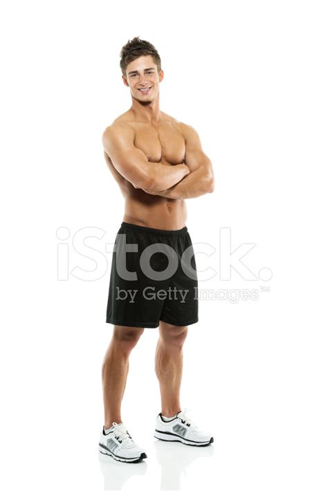 Muscular Man Standing With Arms Crossed Stock Photo Royalty Free